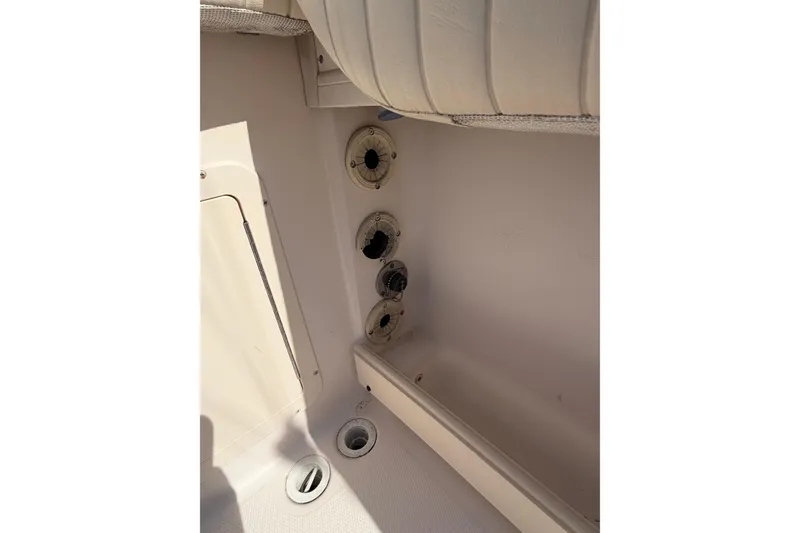 Slide: The Image of Interior view of a 2008 Grady-White Canyon 336 boat, showing seating and storage compartments. - 32