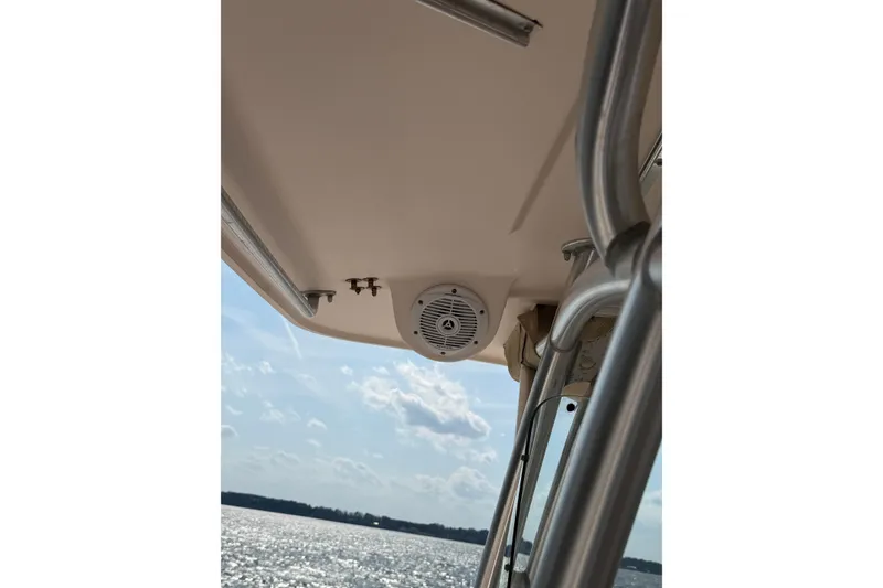 Slide: The Image of 2008 Grady-White Canyon 336 boat interior with speaker, overlooking sunny water. - 36