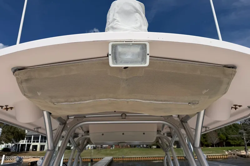Slide: The Image of 2008 Grady-White Canyon 336 boat canopy with light and storage compartment. - 39
