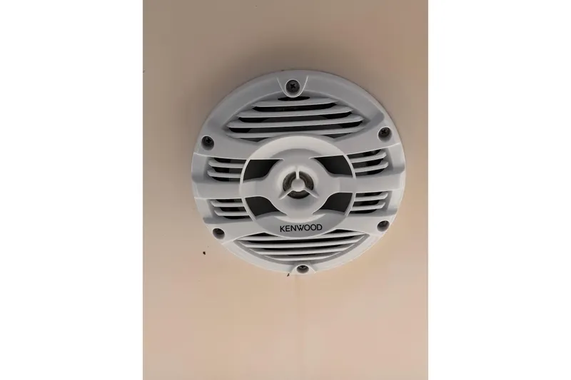 Slide: The Image of Kenwood marine speaker installed on 2008 Grady-White Canyon 336 boat ceiling. - 42