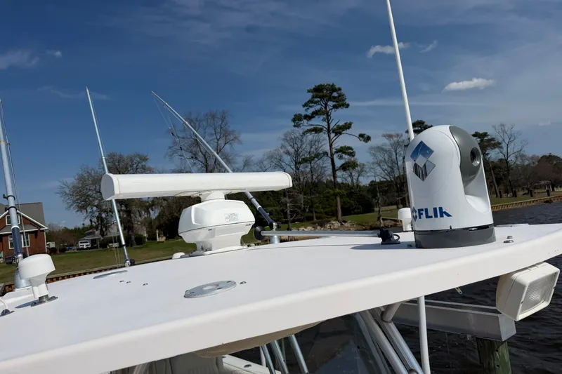 Slide: The Image of 2008 Grady-White Canyon 336 boat with radar and FLIR camera on deck. - 45