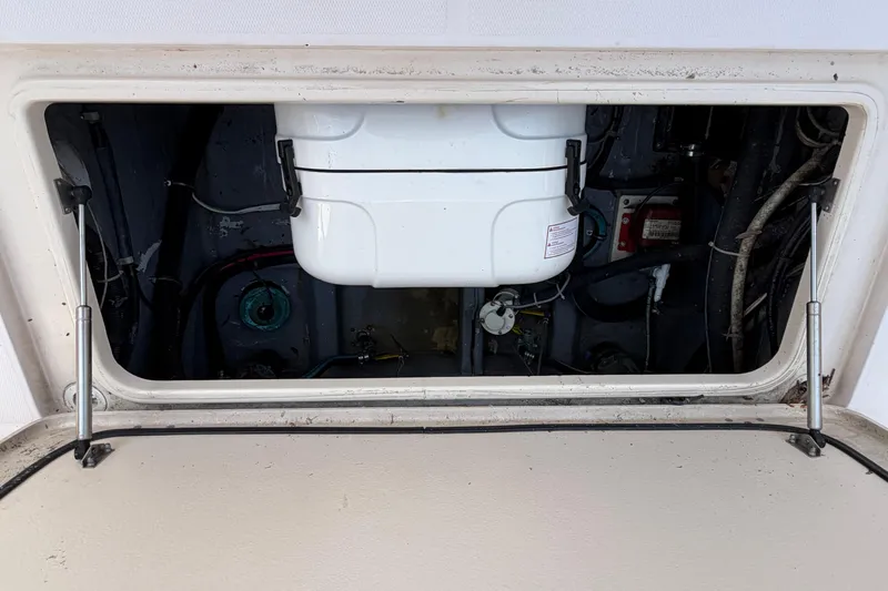 Slide: The Image of Open hatch of 2008 Grady-White Canyon 336 boat showing interior components. - 7