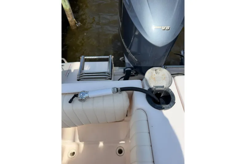 Slide: The Image of 2008 Grady-White Canyon 336 boat with Yamaha V8 engine and fuel hose connection. - 8