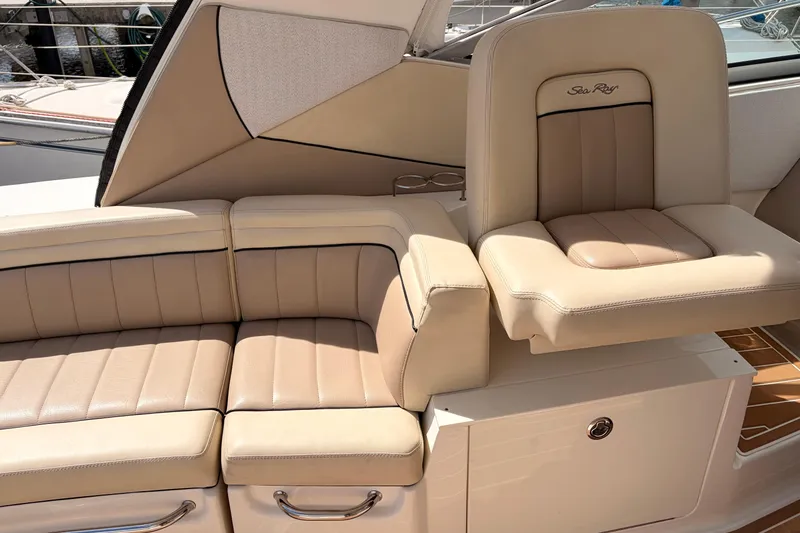Slide: The Image of Luxurious beige seating on a 2008 Sea Ray Sundancer 350 yacht, showcasing comfort and style. - 10