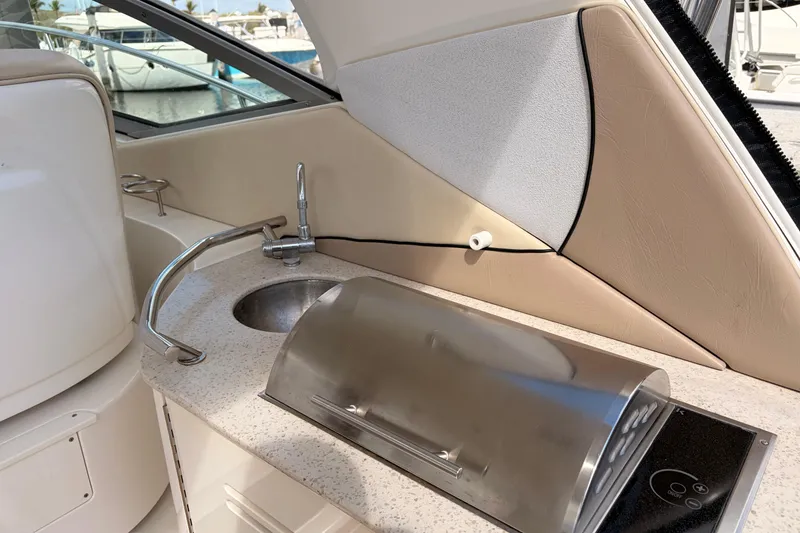 Slide: The Image of 2008 Sea Ray Sundancer 350 yacht kitchenette with sink and grill. - 11