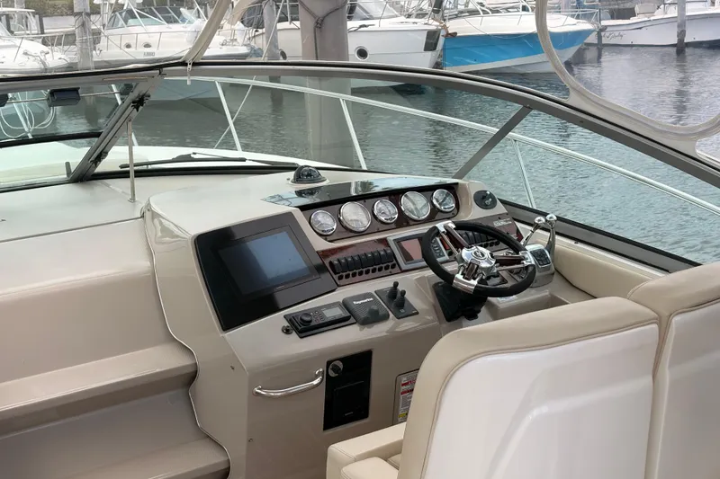 Slide: The Image of Helm of 2008 Sea Ray Sundancer 350 with modern controls and gauges. - 15