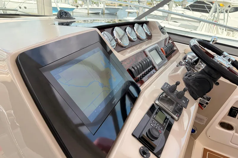Slide: The Image of Control panel of a 2008 Sea Ray Sundancer 350 yacht with navigation display. - 17