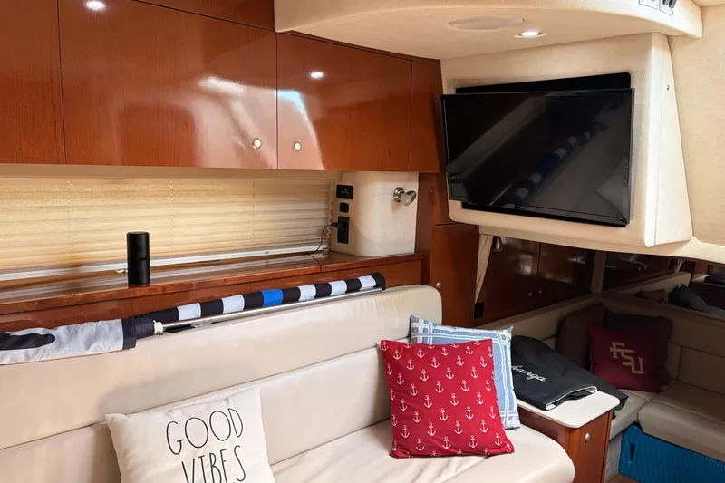 Slide: The Image of Interior of 2008 Sea Ray Sundancer 350 yacht with cozy seating and modern amenities. - 26