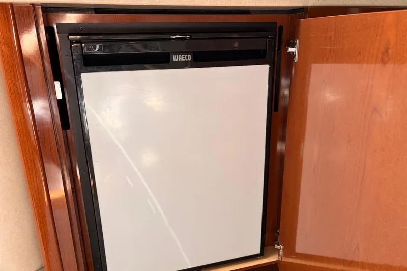 Slide: The Image of Waeco refrigerator inside 2008 Sea Ray Sundancer 350 yacht, wooden cabinetry. - 30