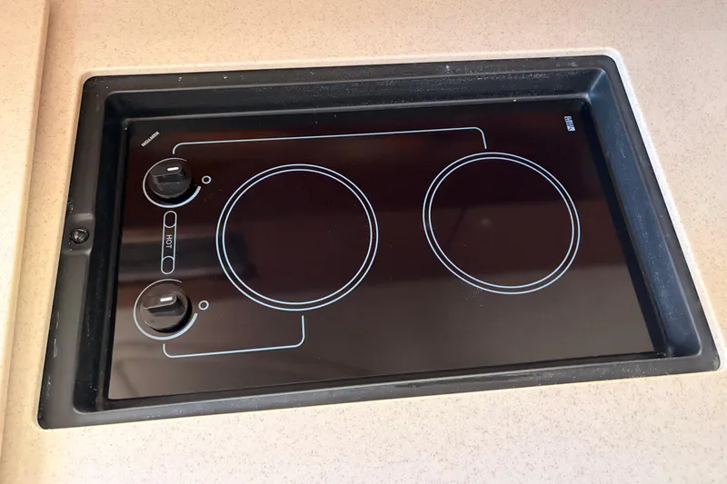 Slide: The Image of Built-in electric stove on 2008 Sea Ray Sundancer 350 yacht kitchen countertop. - 32