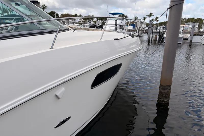 Slide: The Image of 2008 Sea Ray Sundancer 350 yacht docked at marina, side view. - 41