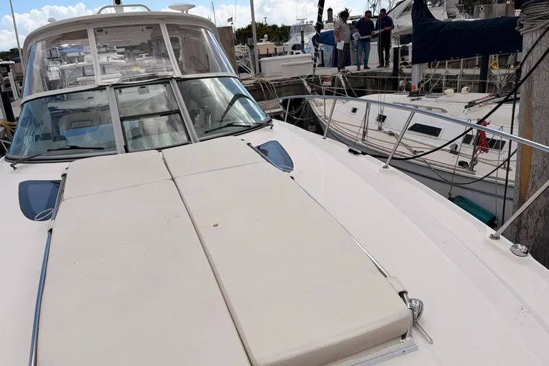 Slide: The Image of 2008 Sea Ray Sundancer 350 yacht docked at marina with other boats. - 45
