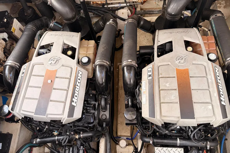 Slide: The Image of Twin Horizon engines in a 2008 Sea Ray Sundancer 350 boat engine compartment. - 47