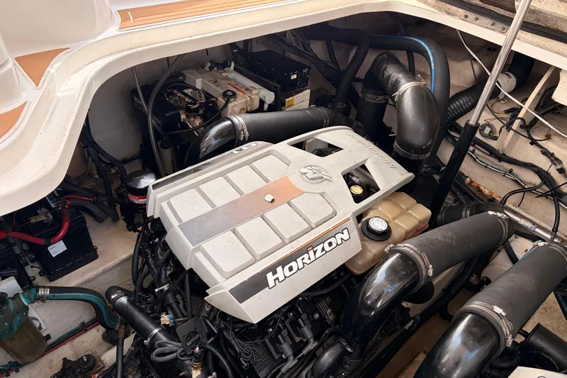 Slide: The Image of Engine compartment of a 2008 Sea Ray Sundancer 350 with Horizon engine. - 48