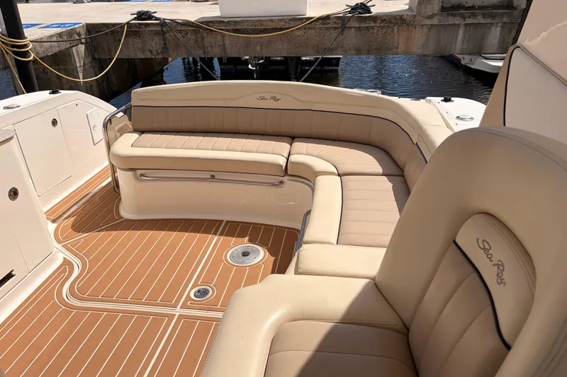 Slide: The Image of Luxurious seating on a 2008 Sea Ray Sundancer 350 yacht with elegant tan upholstery. - 5
