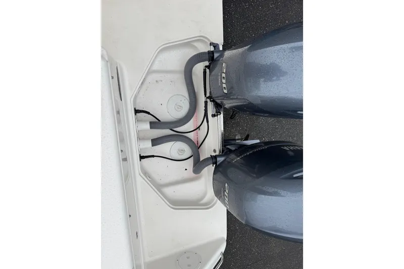 Slide: The Image of 2016 Pursuit DC 265 Dual Console boat with twin 200 horsepower engines. - 13