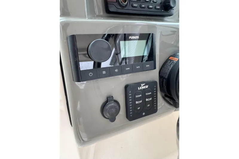 Slide: The Image of Control panel of a 2016 Pursuit DC 265 Dual Console boat. - 41