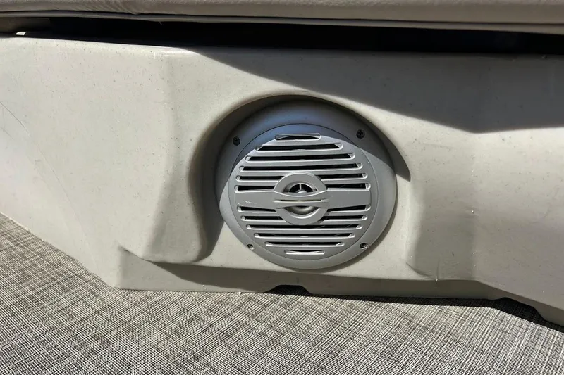 Slide: The Image of Speaker on 2023 Cypress Cay Seabreeze 232 boat, mounted on beige panel. - 23