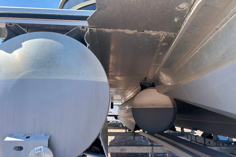Slide: The Image of Underneath view of 2023 Cypress Cay Seabreeze 232 pontoon boat, showcasing pontoons and structure. - 27