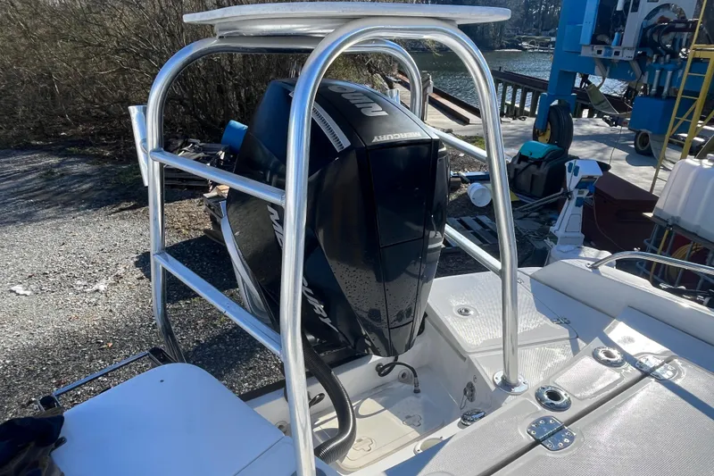 Slide: The Image of 2019 Boston Whaler 240 Dauntless boat with Mercury outboard engine, dockside view. - 11