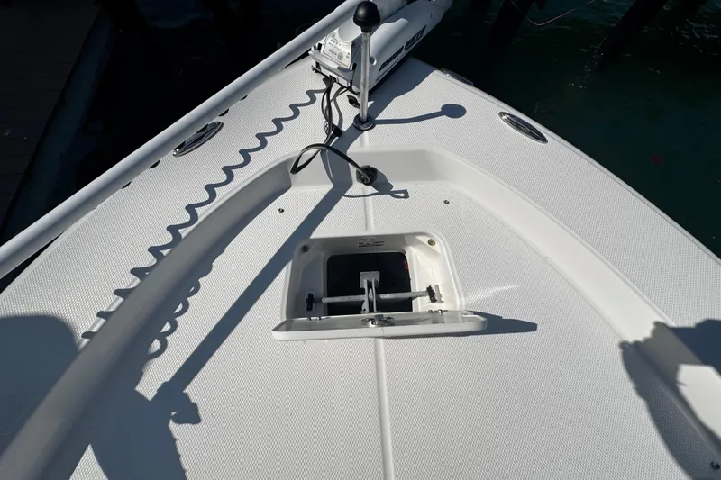 Slide: The Image of Bow deck of a 2015 Robalo 226 Cayman boat with anchor storage. - 39