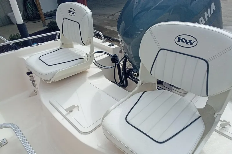Slide: The Image of 2007 Key West 196 Bay Reef boat seats with Yamaha engine in background. - 14