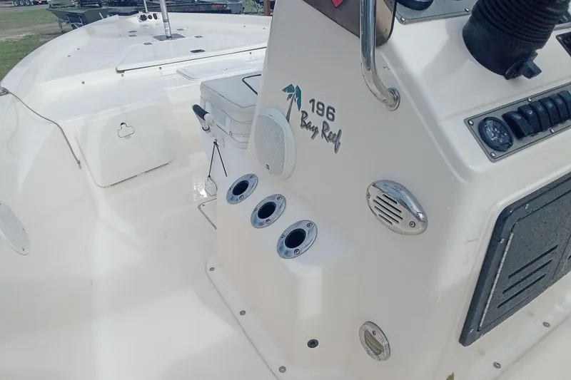 Slide: The Image of 2007 Key West 196 Bay Reef boat interior with control panel and seating. - 16