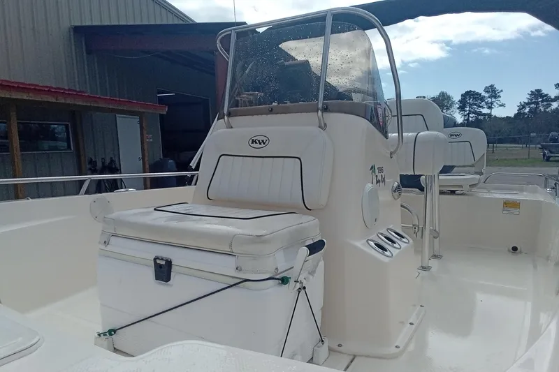 Slide: The Image of 2007 Key West 196 Bay Reef boat interior with console and seating. - 19