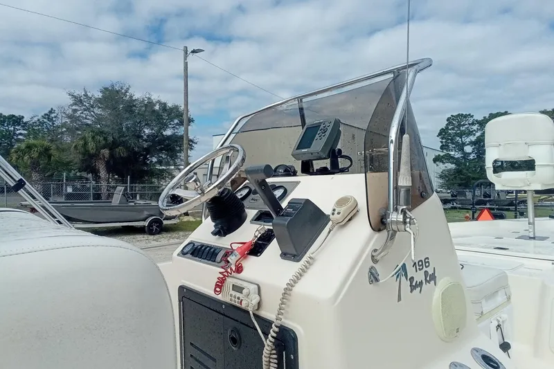 Slide: The Image of 2007 Key West 196 Bay Reef boat console with steering wheel and navigation equipment. - 20