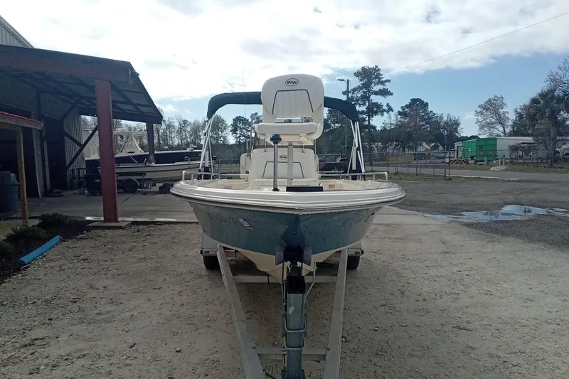 Slide: The Image of 2007 Key West 196 Bay Reef boat on trailer in outdoor setting. - 4