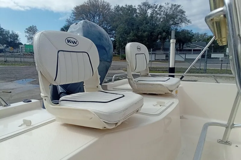 Slide: The Image of 2007 Key West 196 Bay Reef boat seats, outdoor setting, overcast sky. - 9