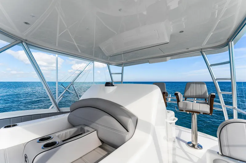 Slide: The Image of Luxurious interior of 2026 Viking 50 Convertible yacht with ocean view. - 6