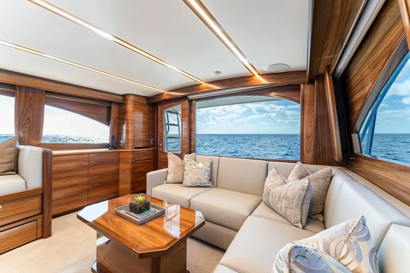 Slide: The Image of Luxurious interior of 2026 Viking 50 Convertible yacht with ocean view. - 9