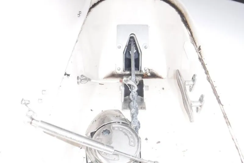 Slide: The Image of Anchor chain mechanism on 2014 Grady-White Freedom 335 boat deck. - 12