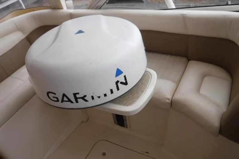 Slide: The Image of 2014 Grady-White Freedom 335 boat interior with Garmin radar equipment. - 18