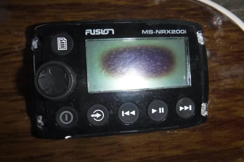 Slide: The Image of Fusion MS-NRX200i marine stereo remote on Grady-White Freedom 335, 2014 model. - 9