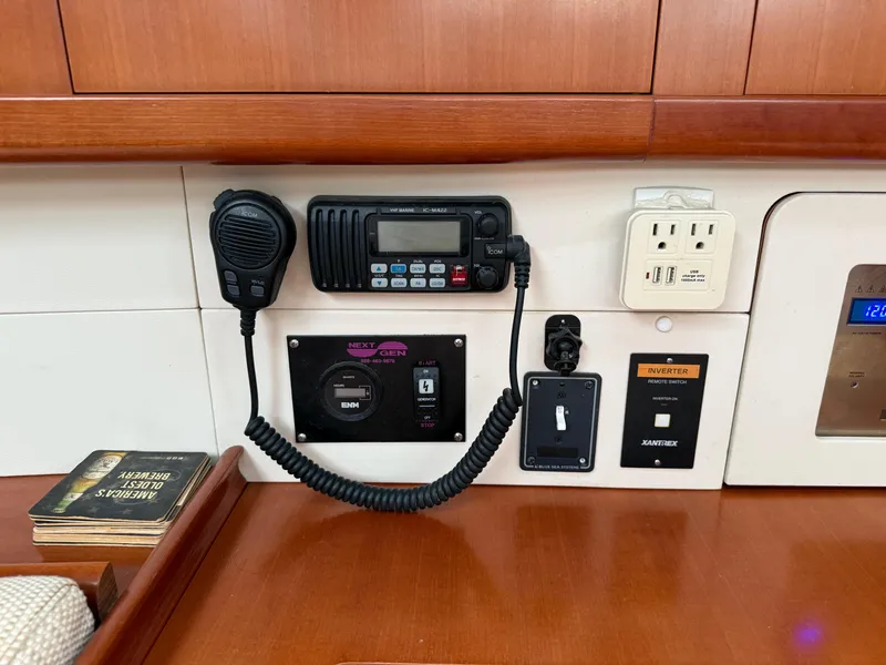 Slide: The Image of Control panel of a 2007 Beneteau 49 yacht with radio and power outlets. - 15