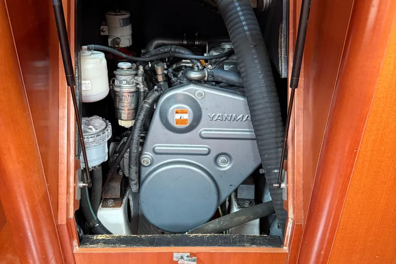 Slide: The Image of Engine compartment of a 2007 Beneteau 49 sailboat with Yanmar engine. - 37