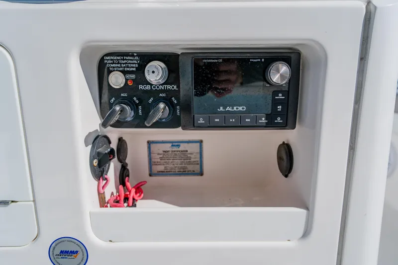 Slide: The Image of Control panel of 2022 Caymas 28 HB boat with JL Audio system and RGB controls. - 27