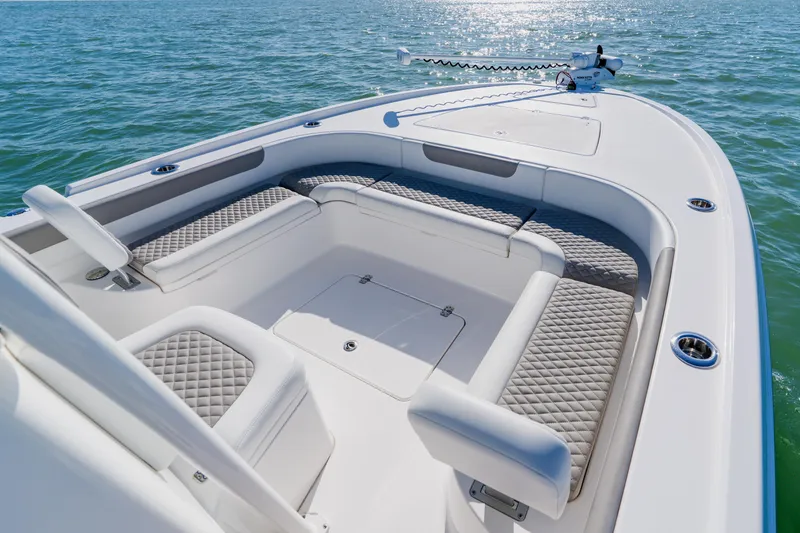 Slide: The Image of 2022 Caymas 28 HB boat with spacious seating on calm water. - 7