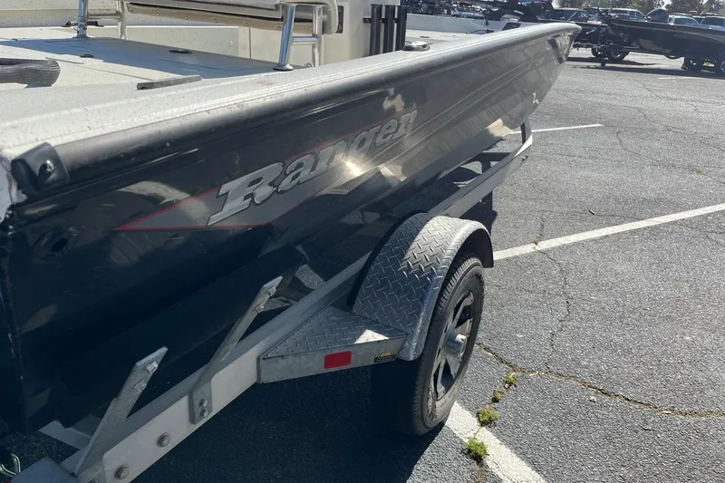 Slide: The Image of 2018 Ranger RB190 Bay boat on trailer in parking lot. - 3