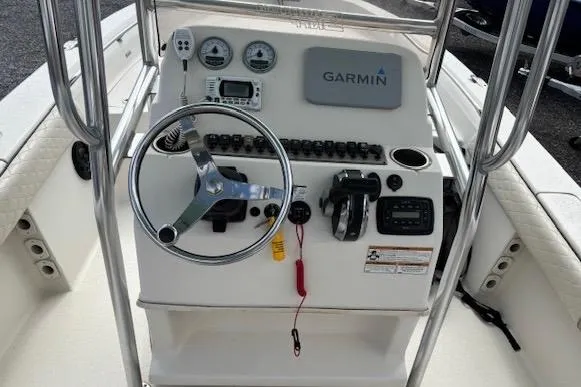 Slide: The Image of 2020 Sea Chaser 23 LX boat console with Garmin navigation system and steering wheel. - 7