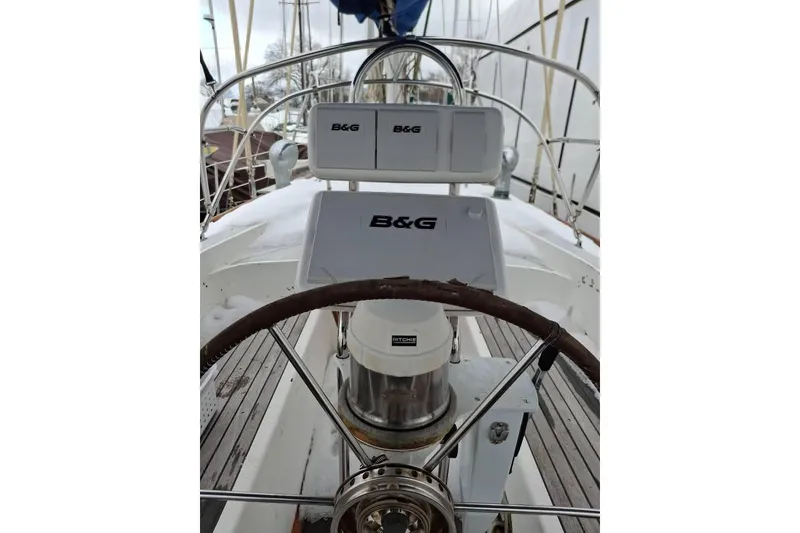 Slide: The Image of Steering wheel and navigation equipment on 1987 Cheoy Lee Pedrick 47 sailboat. - 3