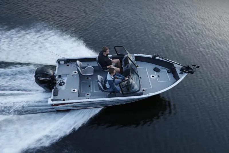 Slide: The Image of Manufacturer Provided Image: 2023 Starcraft Stealth 166 DC boat cruising on water. - 12