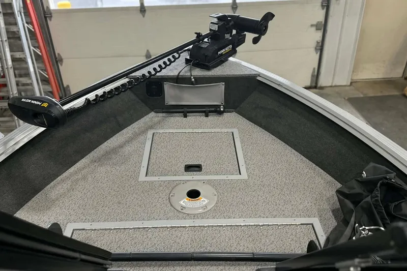 Slide: The Image of 2023 Starcraft Stealth 166 DC boat interior with Minn Kota trolling motor. - 8