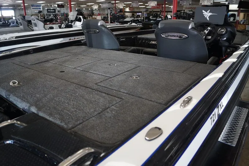 Slide: The Image of 2026 Phoenix 721 ZXL boat interior with spacious deck and seating in showroom. - 14