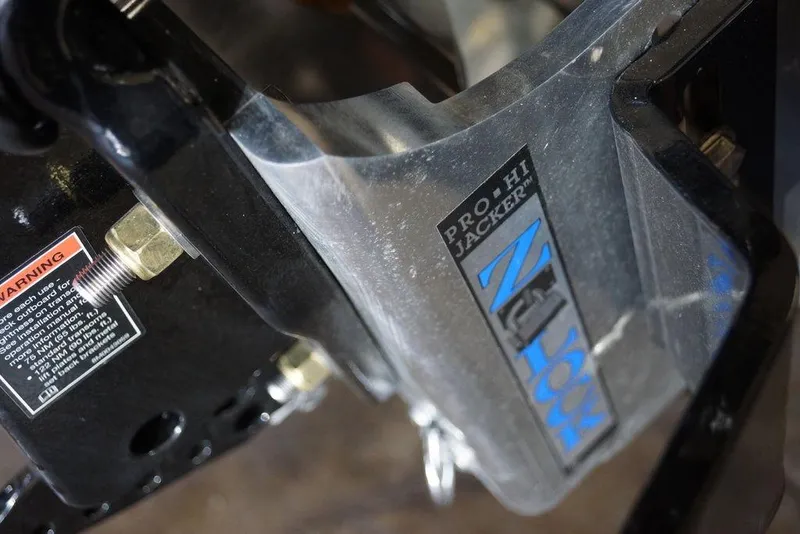 Slide: The Image of Close-up of Phoenix 721 ZXL 2026 Pro-Hi Jacker component with warning label. - 15