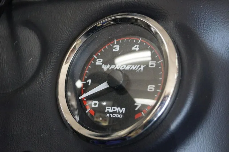 Slide: The Image of Close-up of a 2026 Phoenix 721 ZXL tachometer displaying RPM readings. - 24
