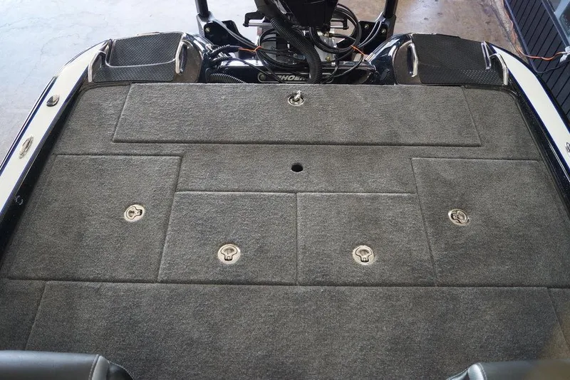 Slide: The Image of Carpeted deck of 2026 Phoenix 721 ZXL boat with storage compartments. - 31