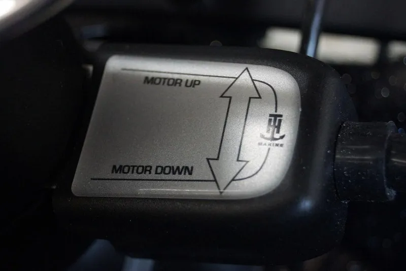 Slide: The Image of Close-up of Phoenix 721 ZXL 2026 motor control switch with up and down arrows. - 32